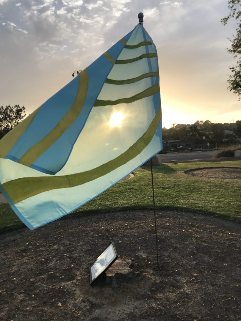 A beautiful flag waving at a lovely sunset