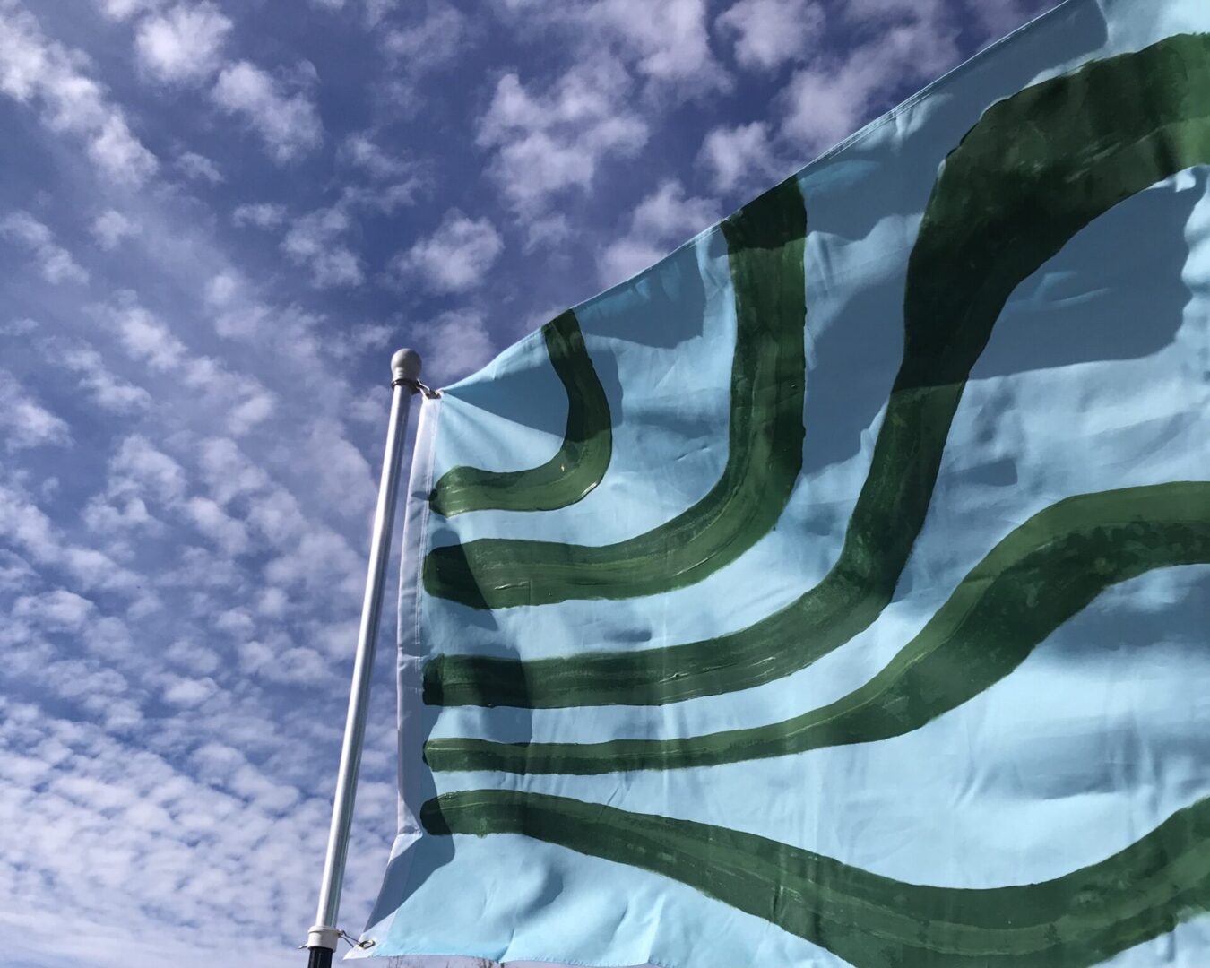 A picture of a flag with green stripes
